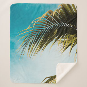 Green palm tree under blue sky sherpa blanket