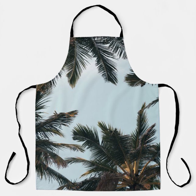 Green palm tree under white sky in the morning apron (Front)