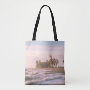 GREEN PALM TREES ON BROWN SAND UNDER WHITE CLOUDS TOTE BAG