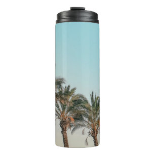 GREEN PALM TREES UNDER BLUE SKY THERMAL TUMBLER
