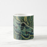 Green Peacock (Emperor) Moth by Vincent van Gogh Coffee Mug<br><div class="desc">Great Peacock Moth or Emperor Moth by Vincent van Gogh is a vintage fine art post impressionism nature painting. A giant Emperor Moth is flying among the flowers and plants in a backyard garden. Van Gogh used butterflies in his works as a symbol of hope. The Death's Head Moth is...</div>