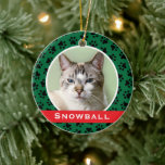 Green Pet Paw Prints Personalized Cat Name Photo Ceramic Ornament<br><div class="desc">This festive custom holiday ornament can be personalized with a cute photo of your pet cat (or dog) and their first name. Includes a green background color with a red monogram stripe and black paw print pattern. Makes a unique Christmas gift for cat lovers or to celebrate kitty's first Christmas!...</div>