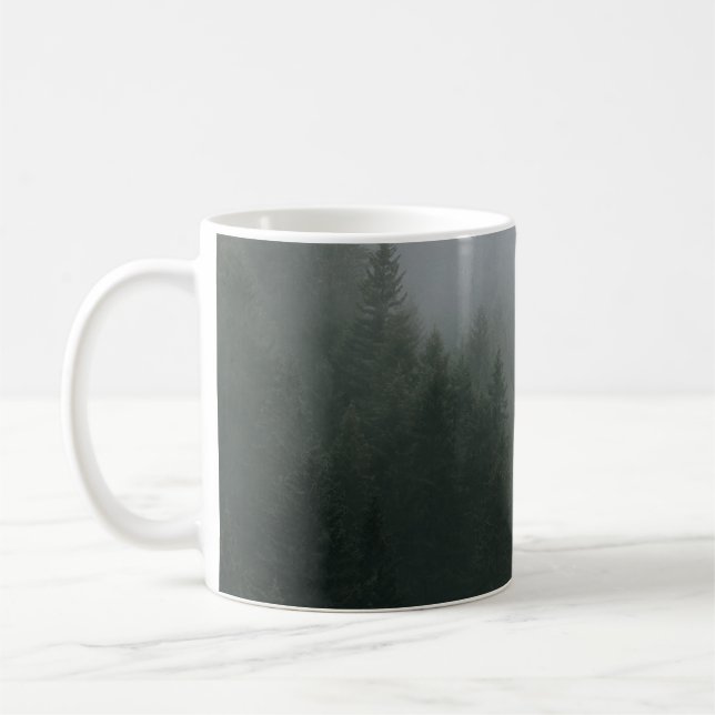 GREEN PINE TREES COVERED WITH FOG COFFEE MUG (Left)