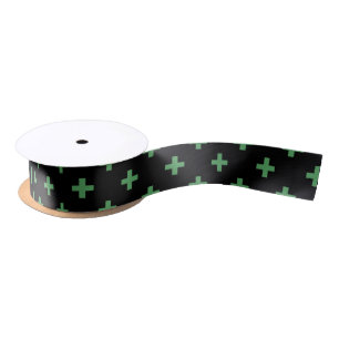 Green polka crosses on black satin ribbon