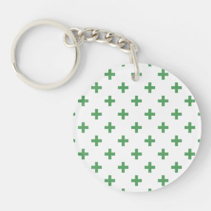 Green polka crosses on white keychain