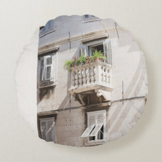 GREEN POTTED PLANT ON BROWN CONCRETE HOUSE BALCONY ROUND PILLOW