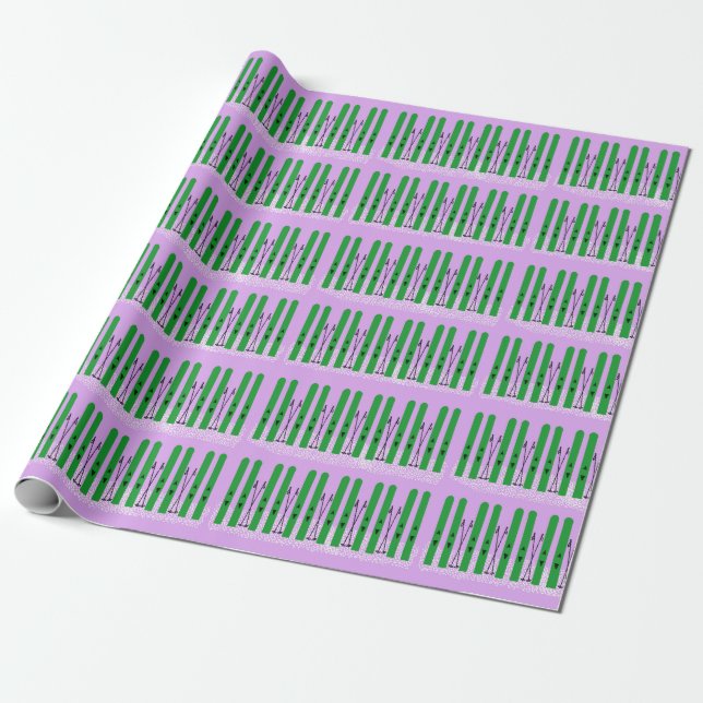Green skis with snow on purple wrapping paper (Unrolled)