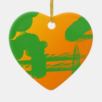 green smudges in orange ceramic ornament