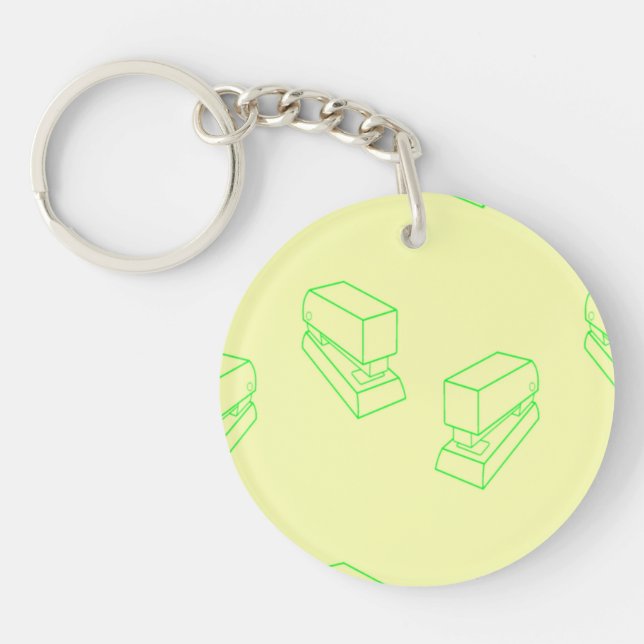 Green stapler on yellow keychain (Front)