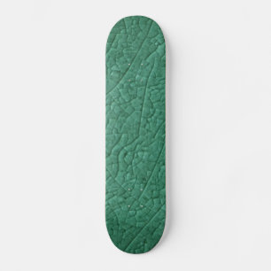 Green stone cracks Skateboard