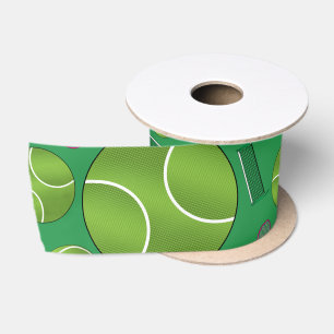 Green tennis balls rackets and nets satin ribbon