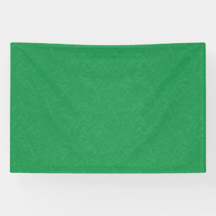 Green textured surface with swirling pattern banner