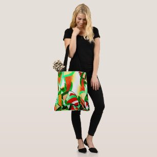 Green tracks, drizzles on coral orange background tote bag