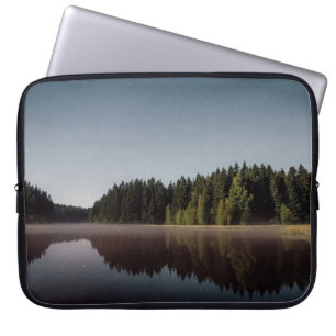 GREEN TREES AND BODY OF WATER LAPTOP SLEEVE