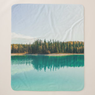 GREEN TREES BESIDE BODY OF WATER DURING DAYTIME SHERPA BLANKET