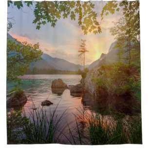 GREEN TREES NEAR BODY OF WATER DURING DAYTIME