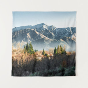 GREEN TREES NEAR SNOW COVERED MOUNTAIN DURING DAYT TAPESTRY