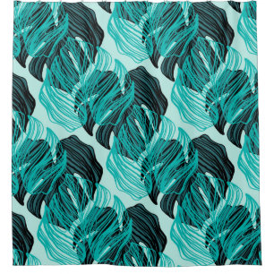 Green tropical palm leaves design.