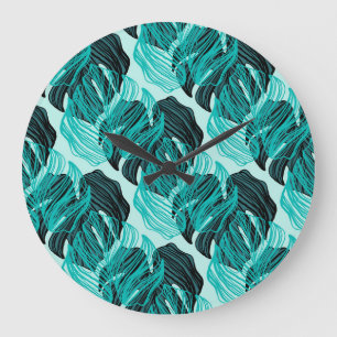 Green tropical palm leaves design. large clock