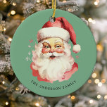 Green Vintage Watercolor Santa Claus Christmas Ceramic Ornament<br><div class="desc">Celebrate the festive season with our Green Vintage Watercolor Santa Claus Christmas Ceramic Ornament! This charming ornament features a nostalgic Santa Claus design set against a stylish solid background, combining vintage charm with modern flair. Perfect for adding a festive touch to your Christmas Tree. Personalize this custom design with your...</div>