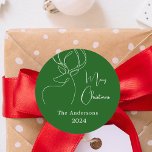 Green white abstract reindeer modern Christmas Classic Round Sticker<br><div class="desc">A green background,  and a white abstract one line reindeer.  Personalize and add a name and year. Text: Merry Christmas</div>