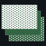 Green/White Christmas Tree Iconic Pattern Wrapping Paper Sheet<br><div class="desc">This is a green and white graphic design created with a seamless iconic pattern of a Christmas tree icon repeated in offset rows. The set of three coordinating sheets includes 1. Green trees on a white background, 2. Is a solid green color, and 3. White trees on a green background....</div>