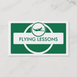 Green white small plane flying pilot business card