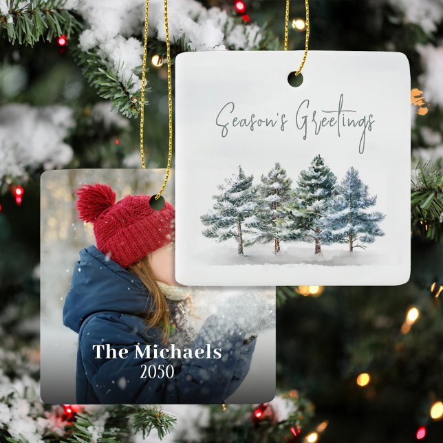 Green Winter Pine Trees Photo Personalized Ceramic Ornament (With script lettering and personalized with your name and year.)