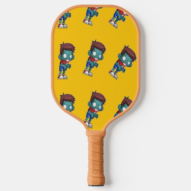 Green zombie kid on orange pickleball paddle (Front)
