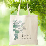 Greenery Eucalyptus Bridesmaid Tote Bag<br><div class="desc">This elegant Bridesmaid Tote Bag is decorated with watercolor eucalyptus leaves in soft shades of green. Easily customizable. To edit further use the Design Tool to change the font, font size, or colour. Because we create our artwork you won't find this exact image from other designers. Original Watercolor © Michele...</div>