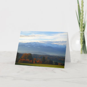 Greeting map of autumn trees before mountains card