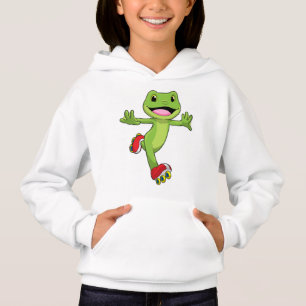 Grenouille en patineur en ligne avec des rollers