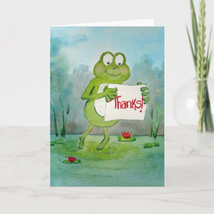 Grenouille lunatique avec le signe de Merci de