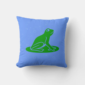 grenouilles vertes sur coussin bleu