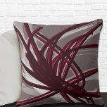 Grey and Burgundy Artistic Abstract Ribbons Throw Pillow<br><div class="desc">Grey and burgundy throw pillow features an artistic abstract ribbon composition with shades of burgundy and grey with white accents on a grey background. This abstract composition is built on combinations of repeated ribbons, which are overlapped and interlaced to form an intricate and complex abstract pattern. The grey, burgundy, white...</div>