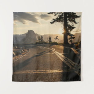 Grey asphalt road near mountain in the morning tapestry