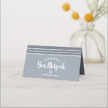 Grey Bar Mitzvah Silver Tallit Bold Script Modern Place Card<br><div class="desc">No Bar Mitzvah party is complete without personalized place cards. Let your favourite Bar Mitzvah be proud, rejoice and celebrate his milestone at his perfectly coordinated party. Bold, dark grey typography and a dark grey and faux silver glitter striped tallit inspired graphic overlay a simple, soft, light grey background. On...</div>