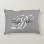 Grey Black and White Fancy Wedding Monogram Accent Pillow<br><div class="desc">A couple's monogram with a fancy calligraphy script in black and white against a grey solid colour background. 
You can customize the colours in this typography design or the fancy and elegant calligraphy styles. 
An accent pillow wedding gift for the newly weds. 
Black,  white and grey home decor.</div>