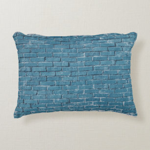 Grey concrete bricks painted in blue accent pillow