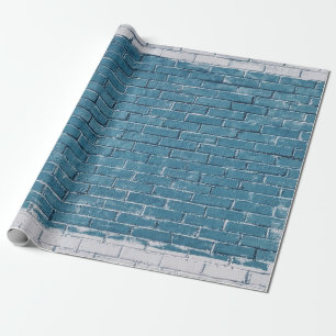 Grey concrete bricks painted in blue wrapping paper