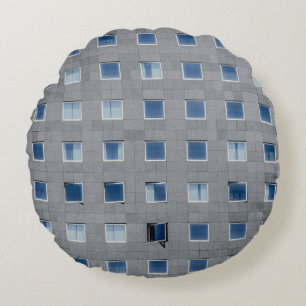 Grey concrete building photography round pillow