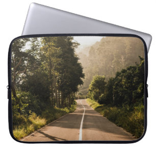 Grey concrete road in the morning laptop sleeve