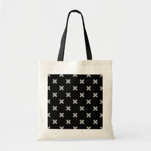 Grey cross stitches on black tote bag