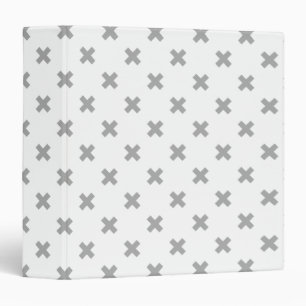 Grey cross stitches on white binder