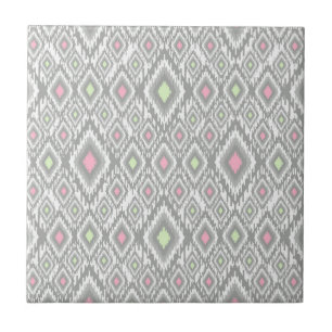 Grey, green, pink rhombuses on a white tile