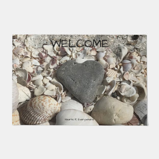 Grey heart stone on beach large doormat