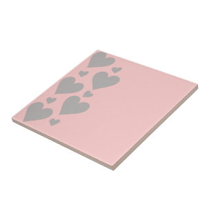 Grey hearts on a pink background tile