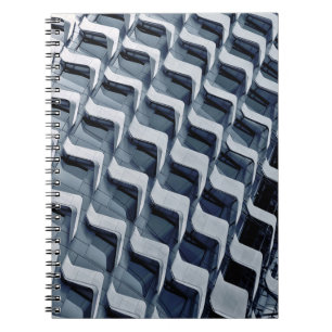 Grey high-rise building notebook