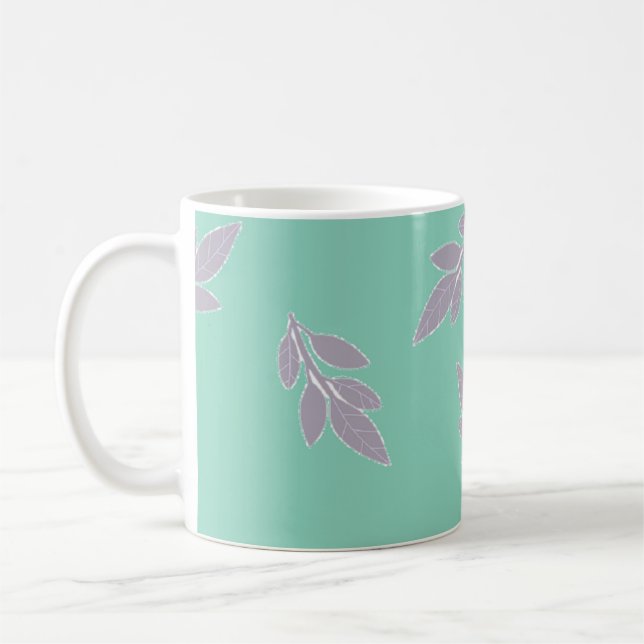 Grey leaves on green coffee mug (Left)