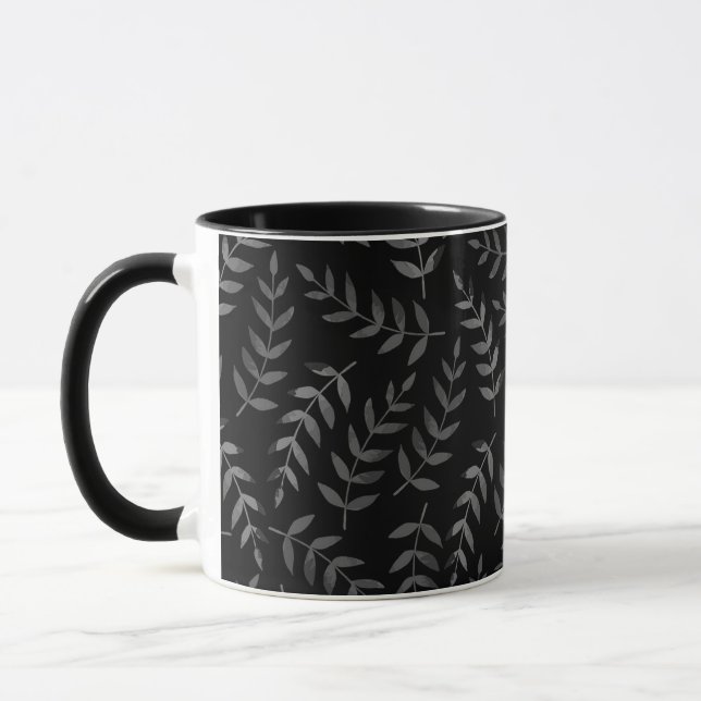 Grey leaves pattern on black mug (Left)